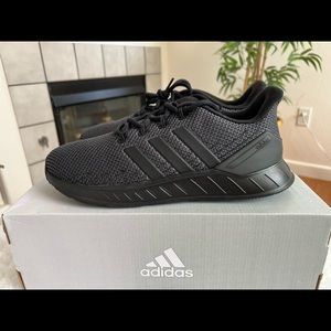 Brand New Adidas Questar Flow NXT for men .